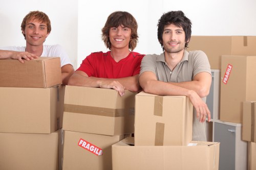 Careful loading of desks and office items during a local business move