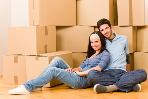 Careful loading of household items into a moving van in Cudham