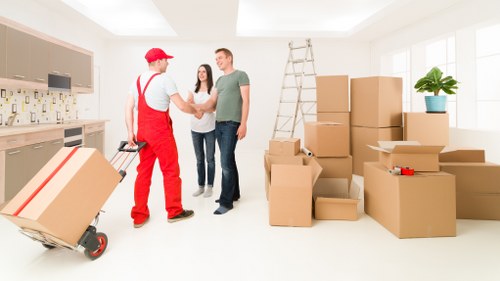 Furniture and boxes loaded into a van for transport in Cudham