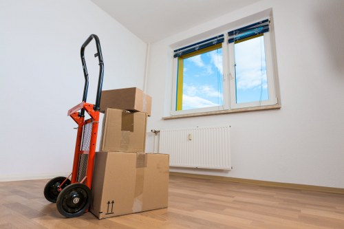 Professional movers loading furniture for a local removal in Cudham