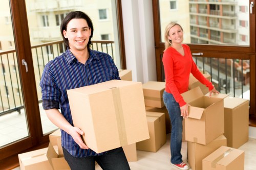Boxes and household items organised for transport during a house move
